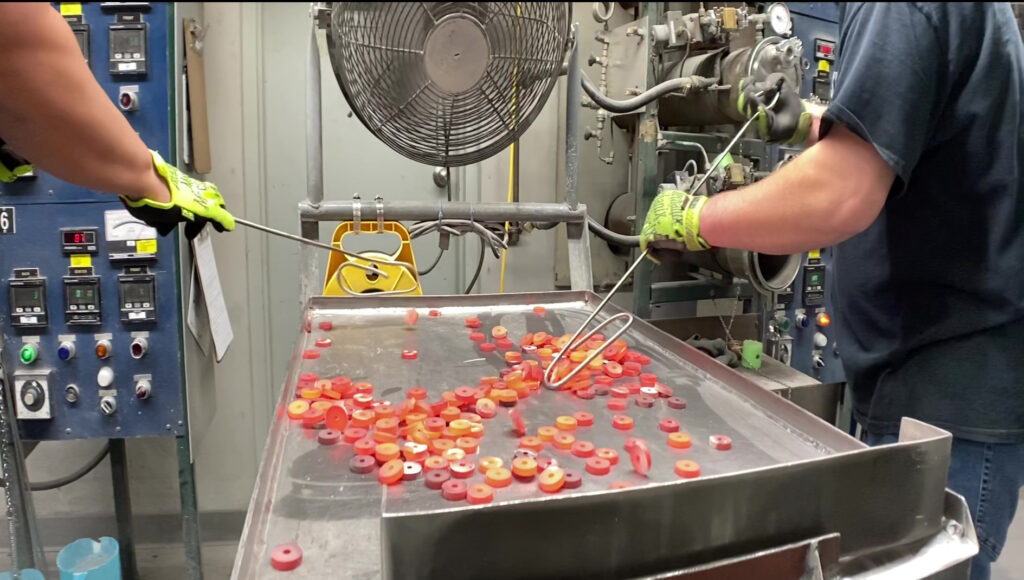 material is being sintered at high temperatures (around 1000–1100°C) in a vacuum