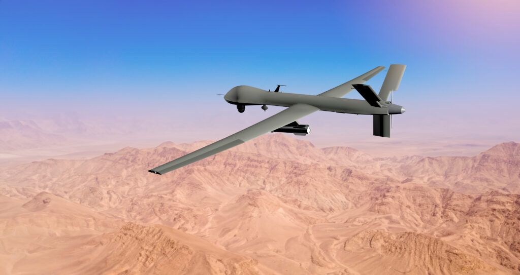 UAV military drone flying over desert